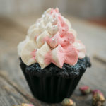 chocolate cupcake with piped frosting