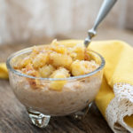 bowl of oatmeal with bananas