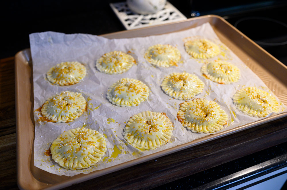 unbaked pies on cookie sheet