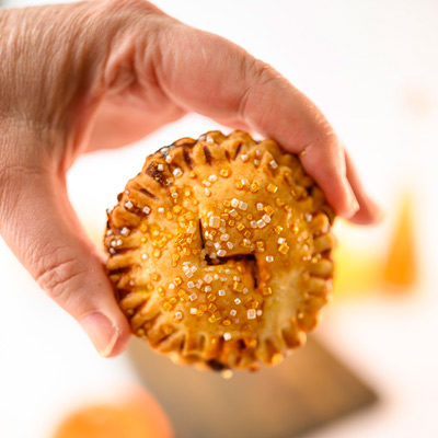 Hand hold a mini hand pie