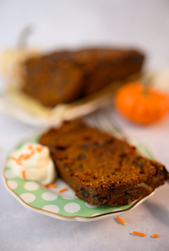 slice of pumpkin bread on a polka dot plate