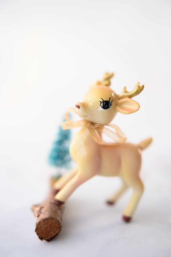 close up view of a vintage inspired deer figurine