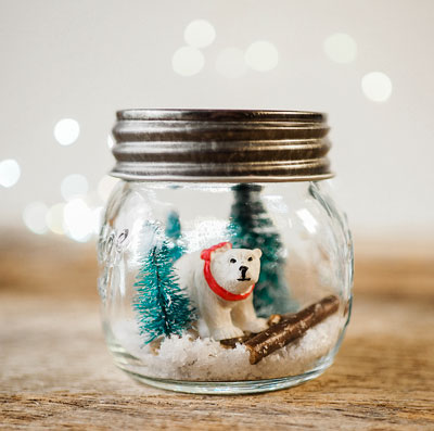 polar bear figure inside a mason jar