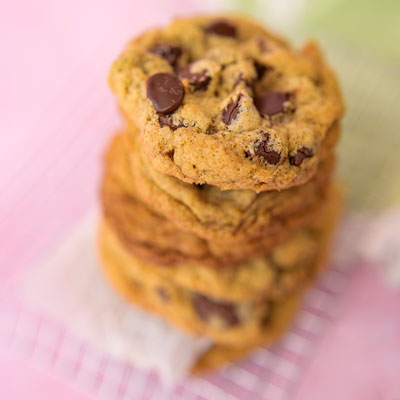 close up of a cookie stack of chocolate chip cookies