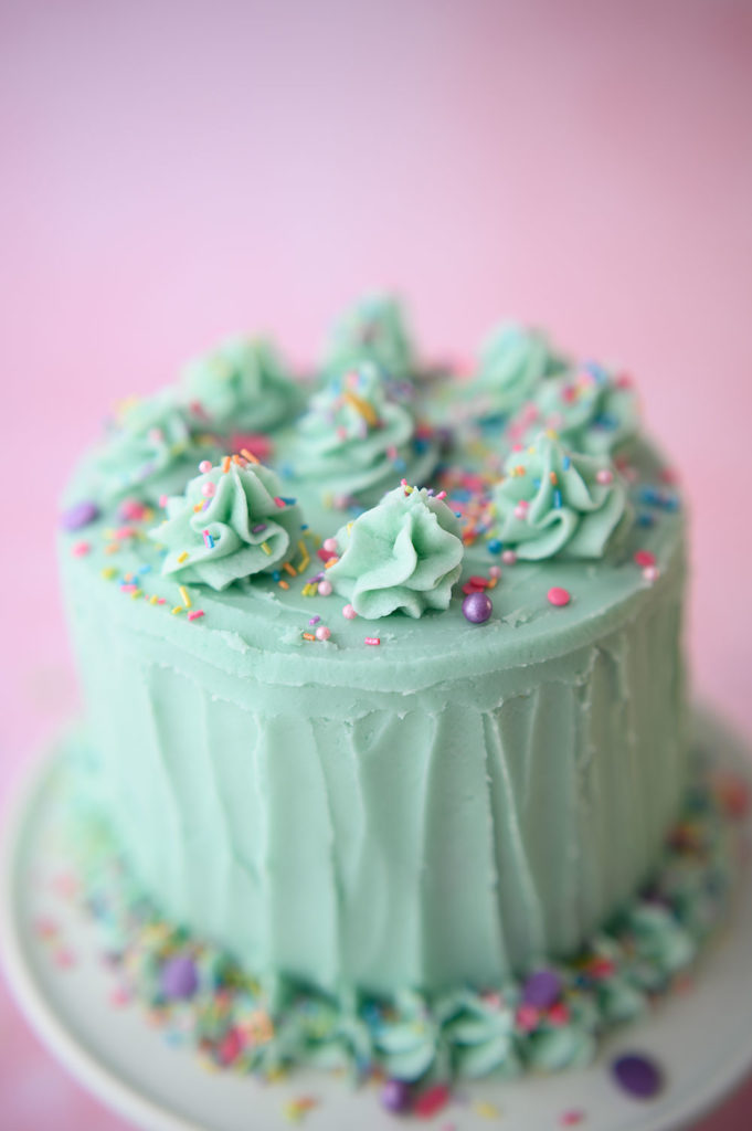 detail of the decoration on top of a home baked layer cake