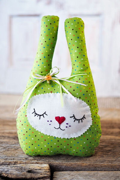 a spring bunny with a machine sewn body and hand stitched face