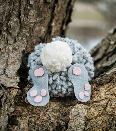 pom pom bunny in a tree