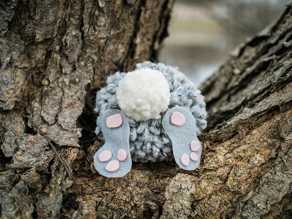 pom pom bunny in a tree