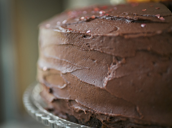 close up of the chocolate frosting on the layer cake