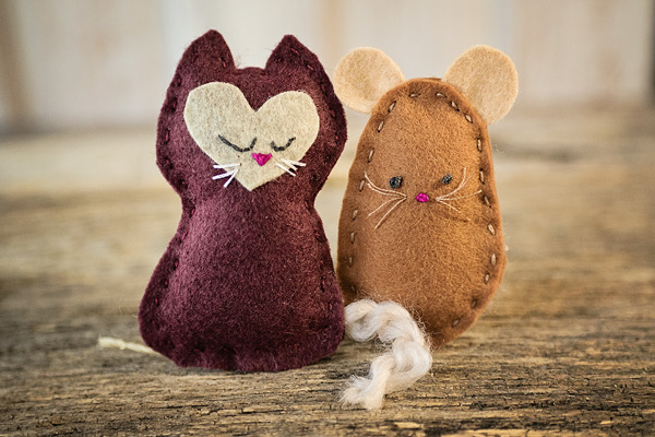 Hand sewn felt kitten and mouse toys shown together