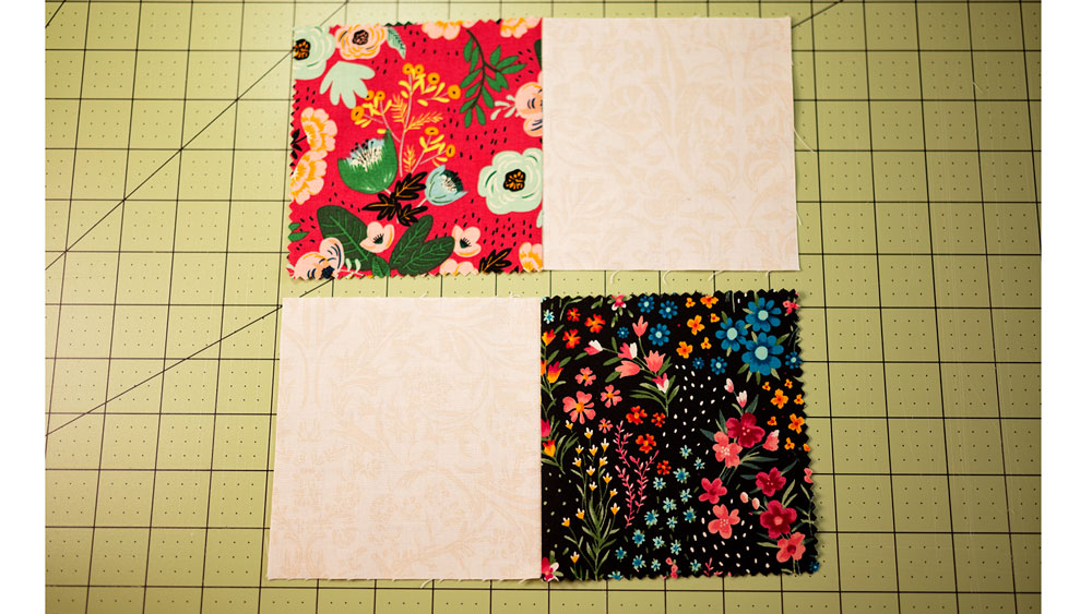 4 fabric squares with each print sewn together with the neutral