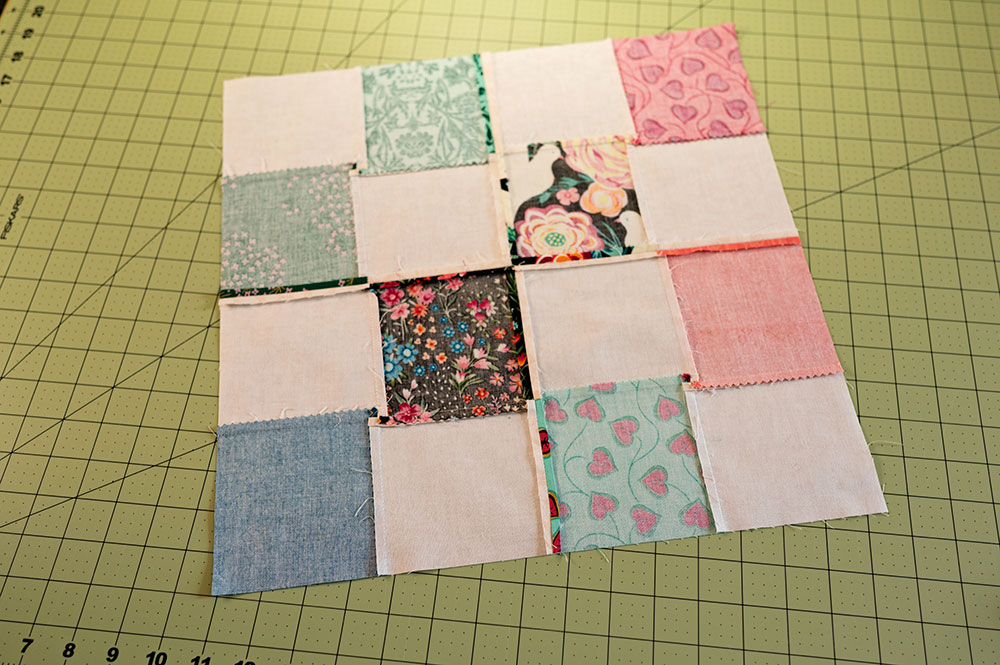 The back side of the quilt top showing all the perfectly pressed seams