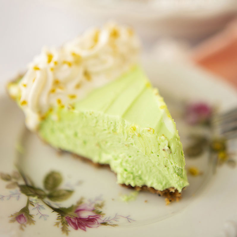 Slice of cheesecake on a vintage plate