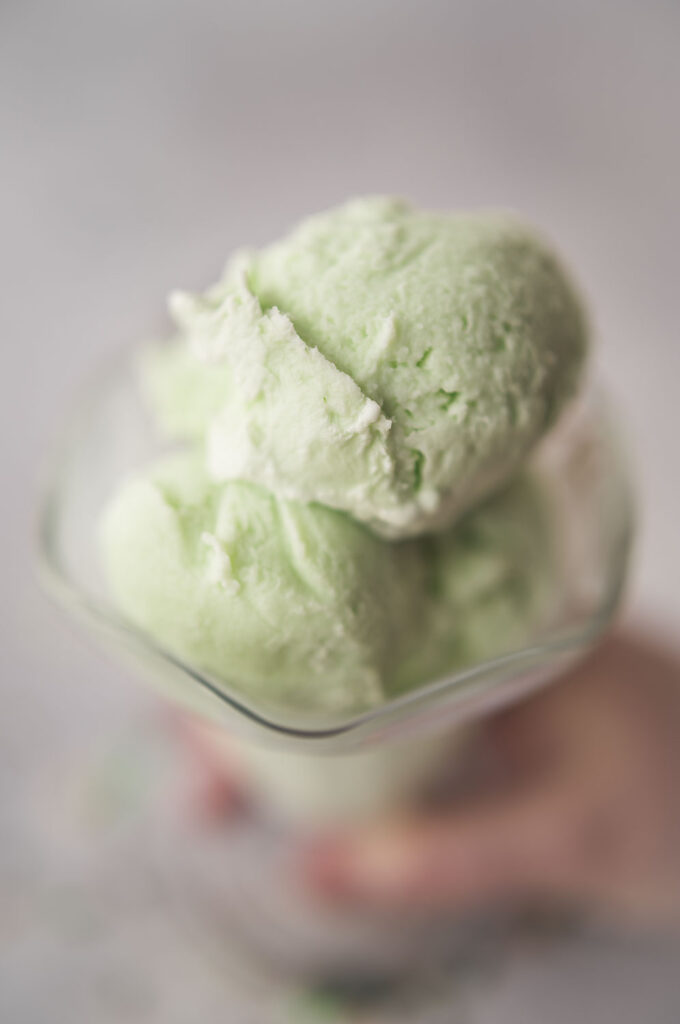 Closeup view of delicate green mint ice cream scoops