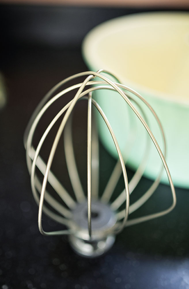 close up of a wire whip used with a stand mixer