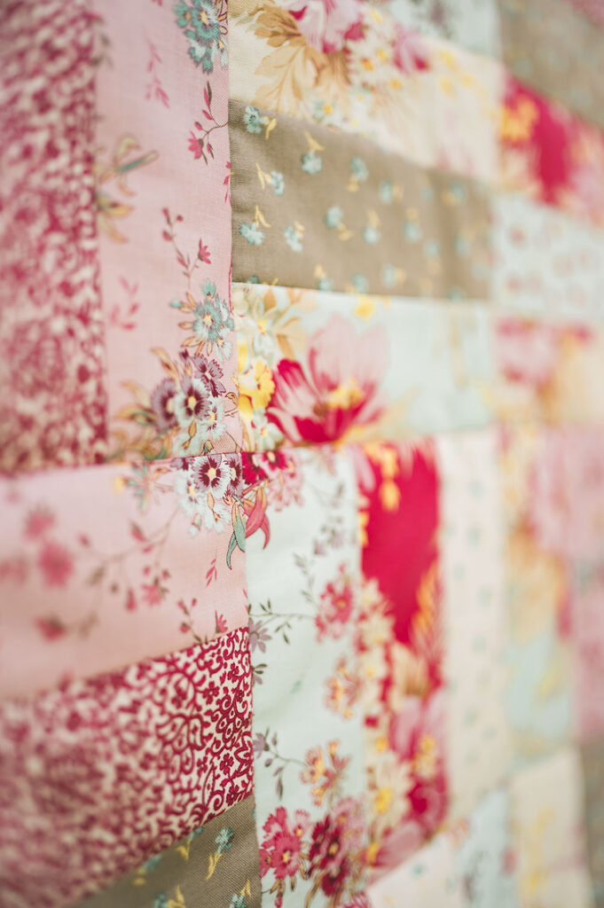 close up view of a patchwork quilt pattern