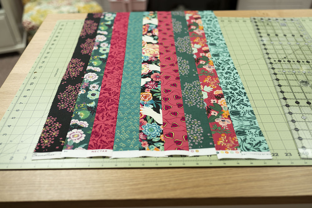 9 jelly roll strips pieced into one large strip set