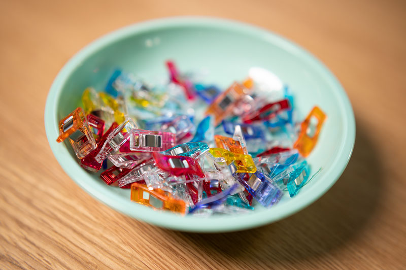 minty green bowl full of colorful wonder clips