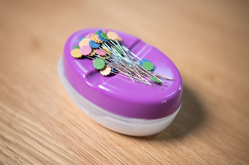 flat head pins in a purple pin keeper