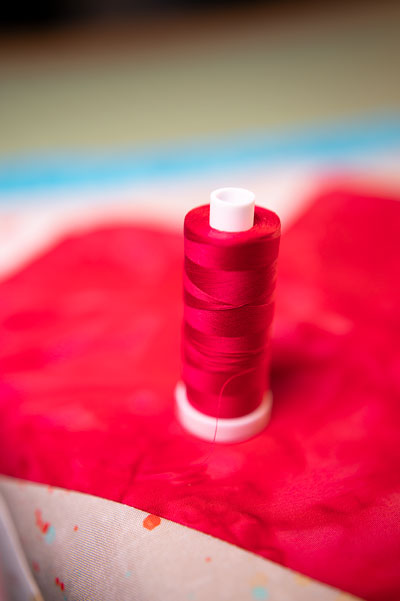 red thread matched to fabric
