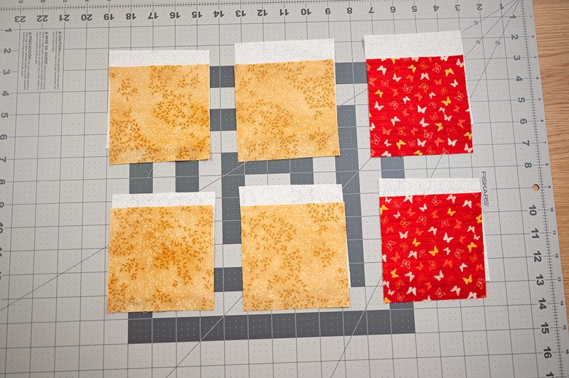 colorful squares of fabric paired with a white background