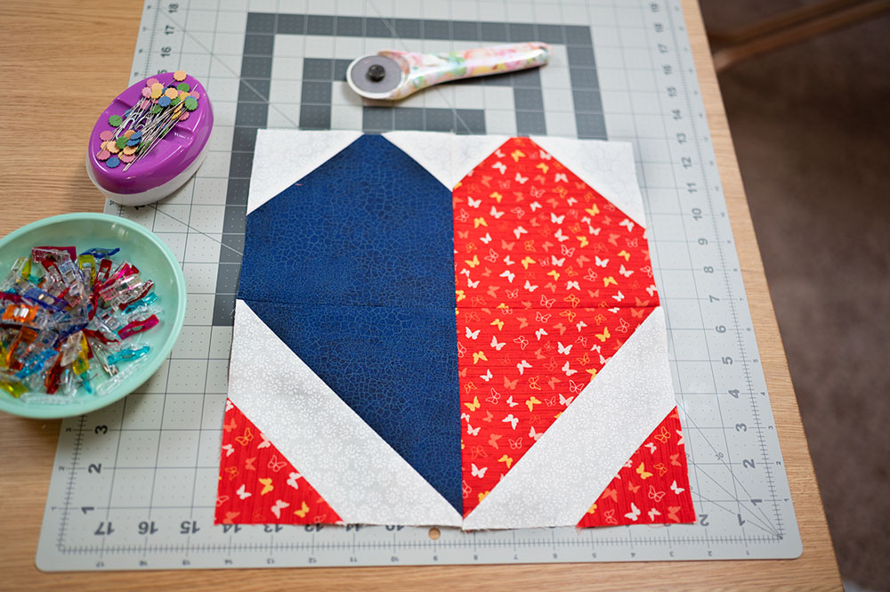 completed quilt block on a cutting mat