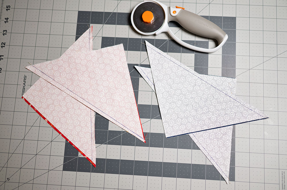 half square triangles cut apart and ready to be pressed