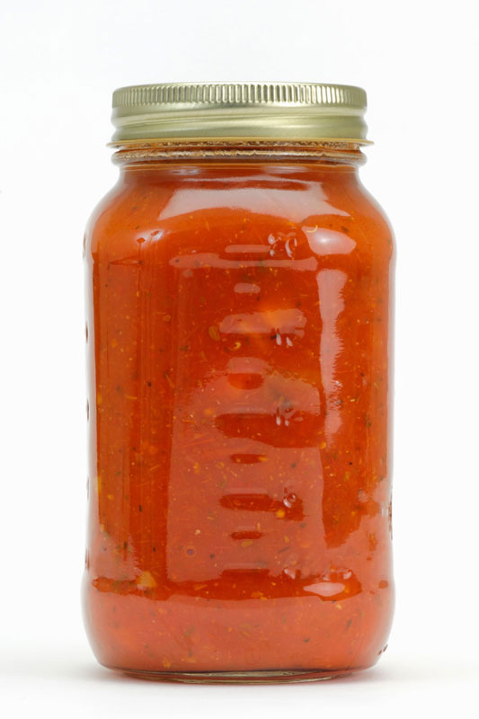 a mason jar of fresh canned tomato sauce