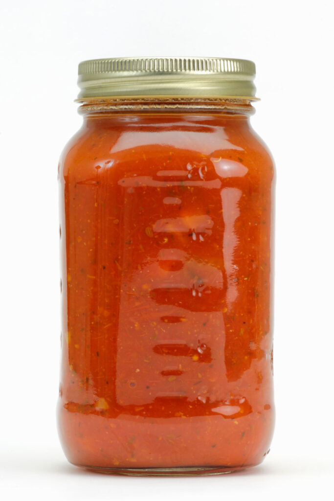 a home canned jar of tomato sauce