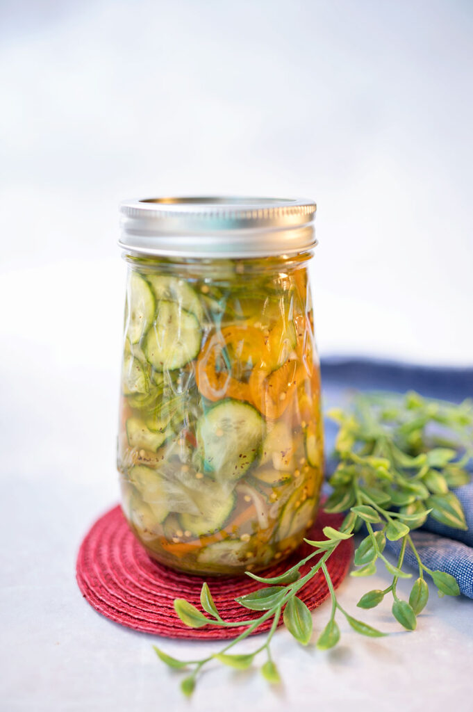 homemade pickles in a fluted jar