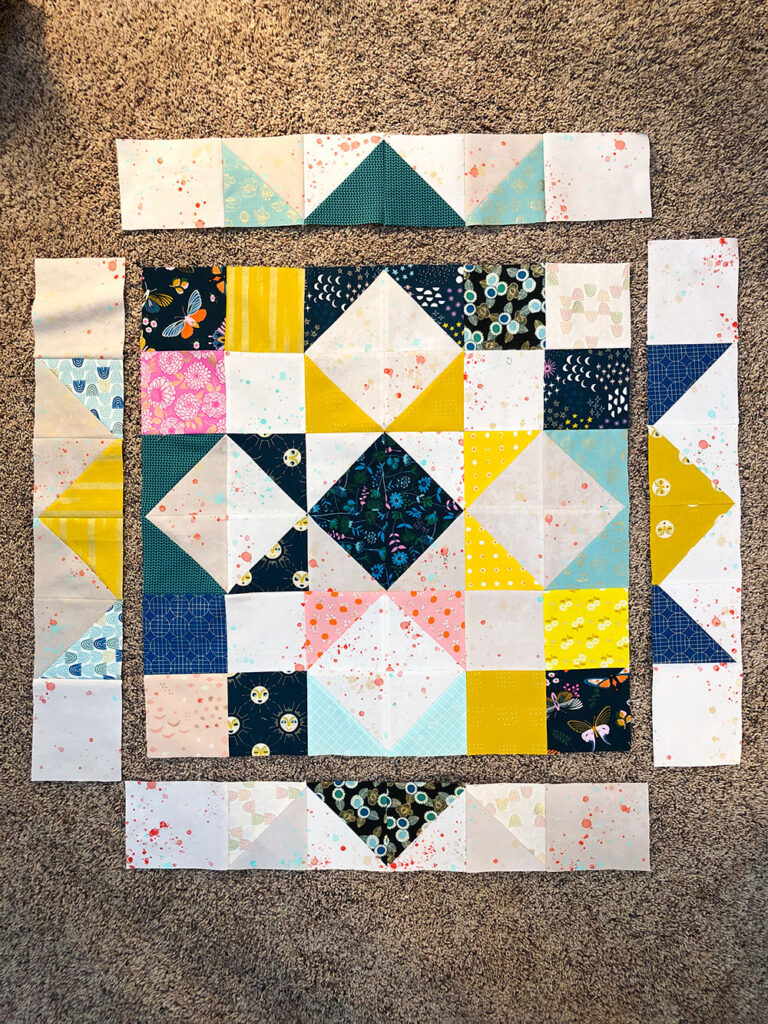 putting the border design onto the quilt block