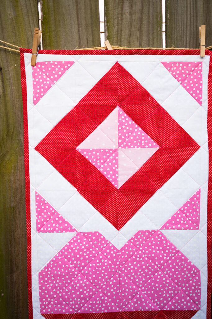 the diamond block as it appears in this quilted table runner