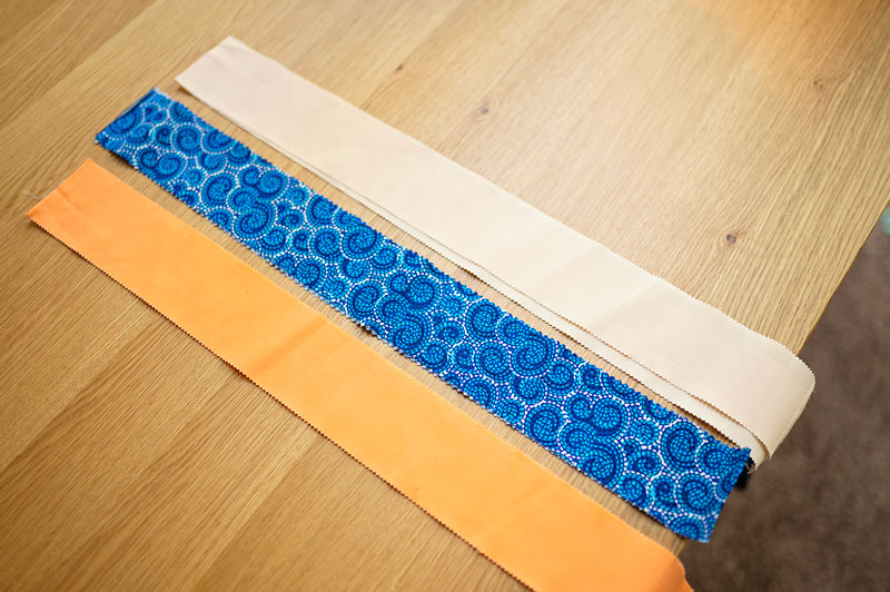 3 2.5" fabric strips ready to be sewn into a rail fence quilt block