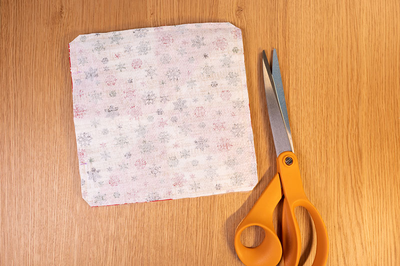 a small piece of sewing with fabric scissors