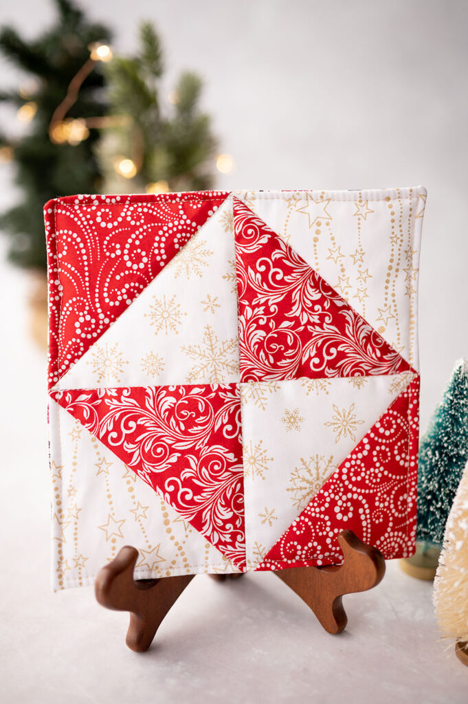 quilt block with four half square triangle units