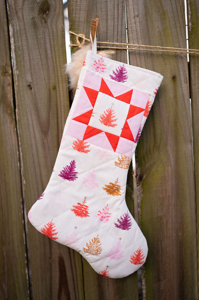 brightly colored quilted Christmas stocking