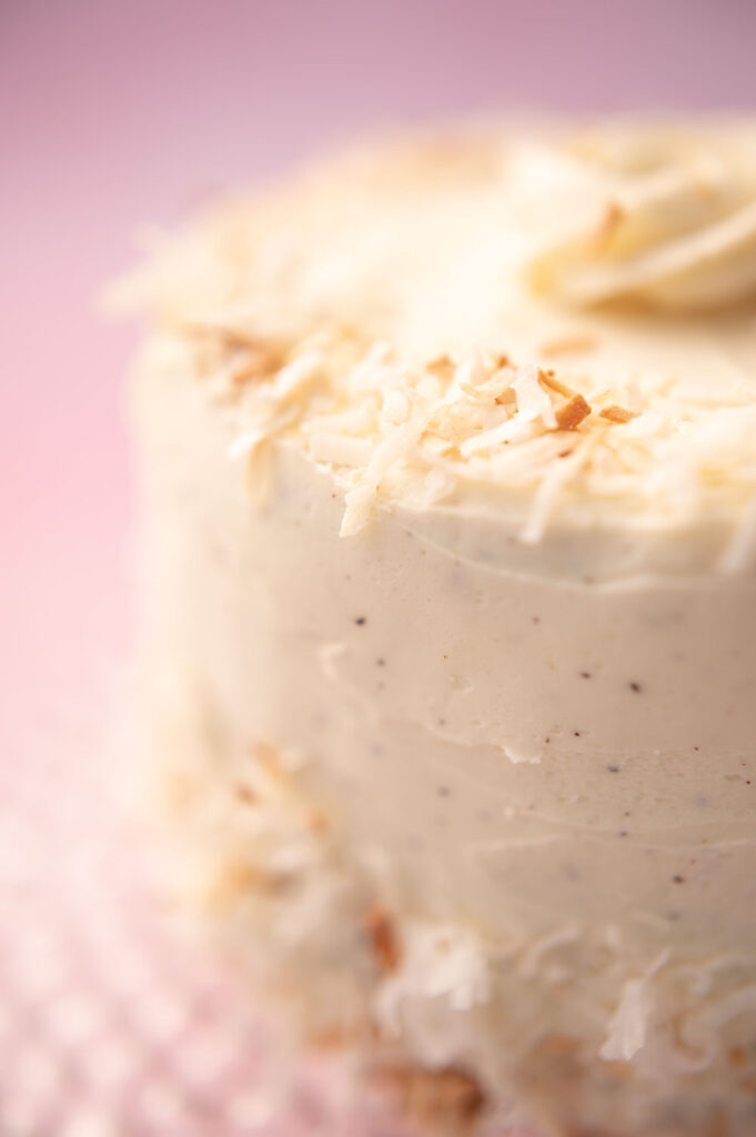 closeup of toasted coconut decorating a cake