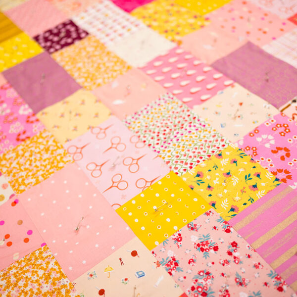 a field of patchwork quilt prints
