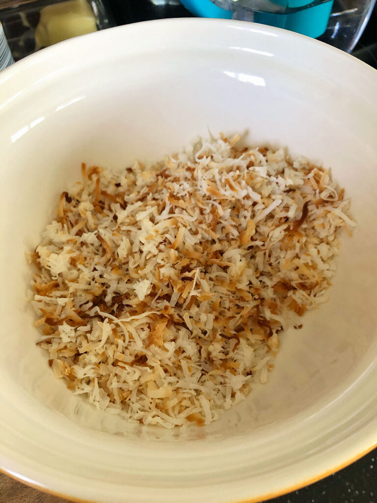 a bowl of toasted coconut