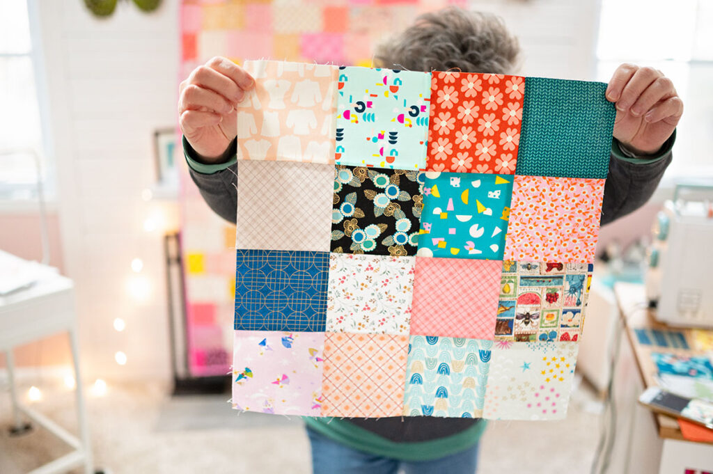 a scrappy quilt block with 16 individual squares