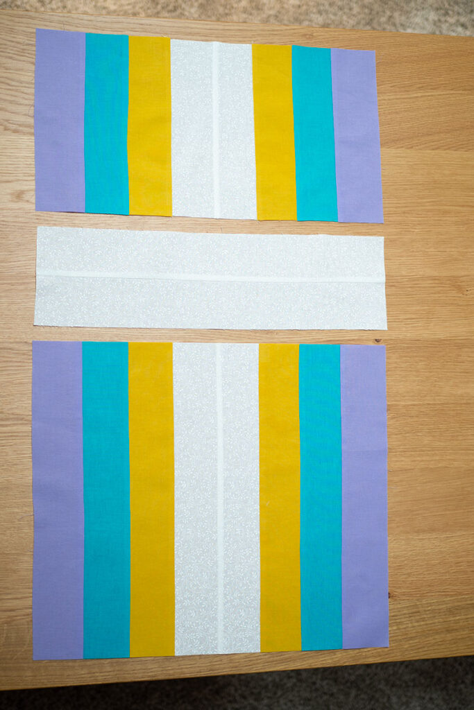 a partially pieced cross quilt