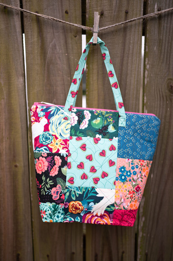 zipper tote bag hanging on a clothesline