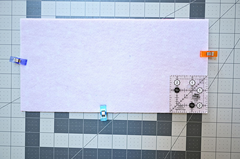 rectangle of fabric with small quilt ruler