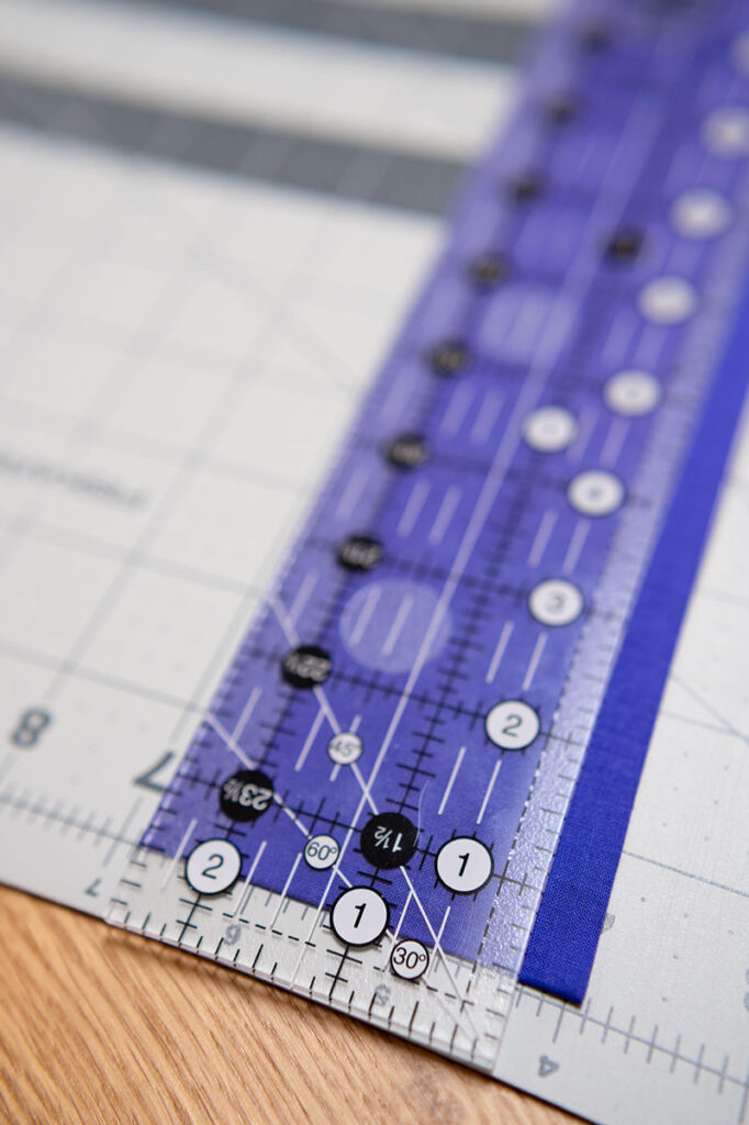 a quilting ruler on fabric