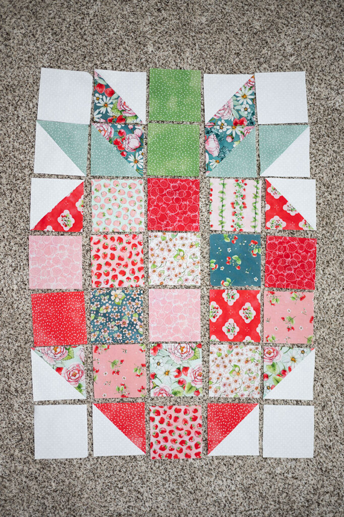 strawberry quilt block laid out for sewing