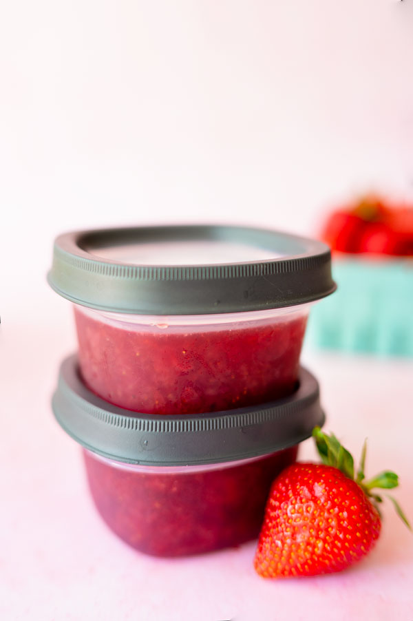 stackable freezer containers filled with Strawberry jam