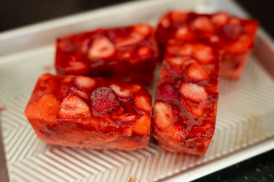 strawberries frozen into blocks