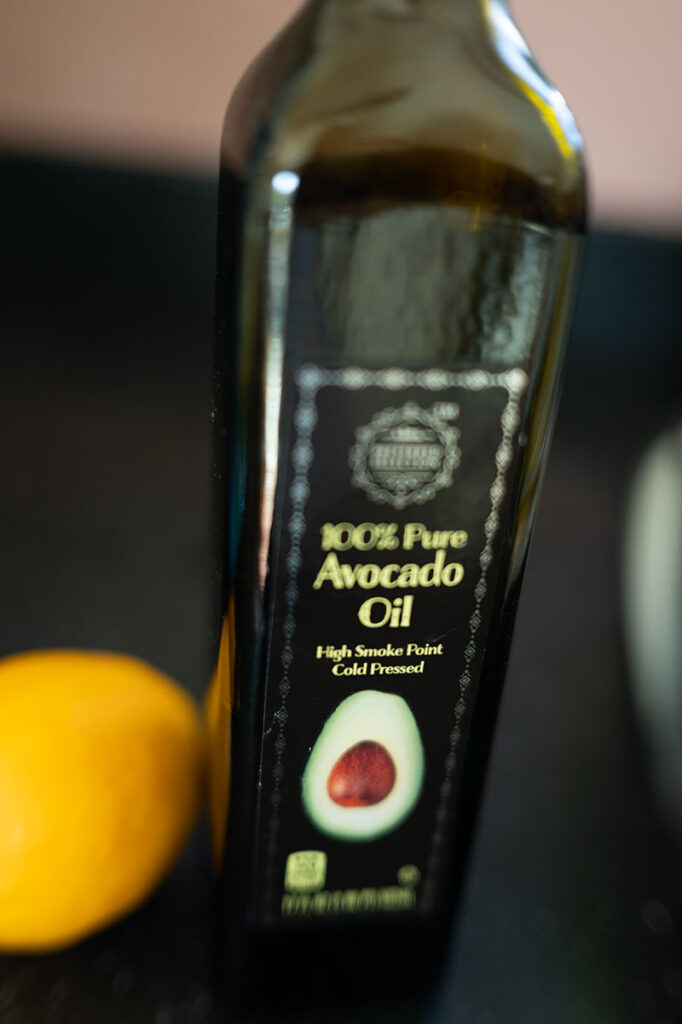 bottle of avocado oil with a lemon
